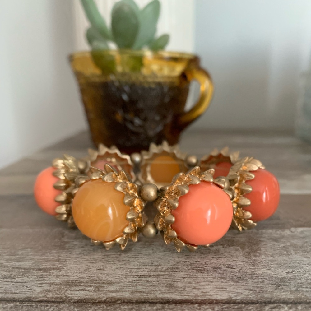 Anthropologie coral and gold bracelet